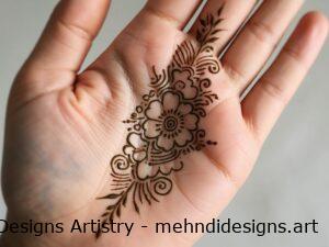 Simple floral mehndi on palm center