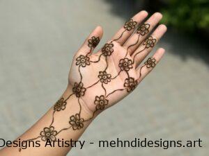 Simple floral mehndi on palm and wrist